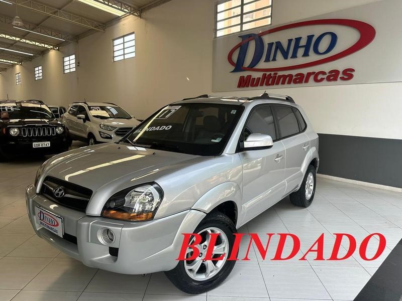 //www.autoline.com.br/carro/hyundai/tucson-20-gls-16v-flex-4p-automatico/2017/sao-paulo-sp/24228587