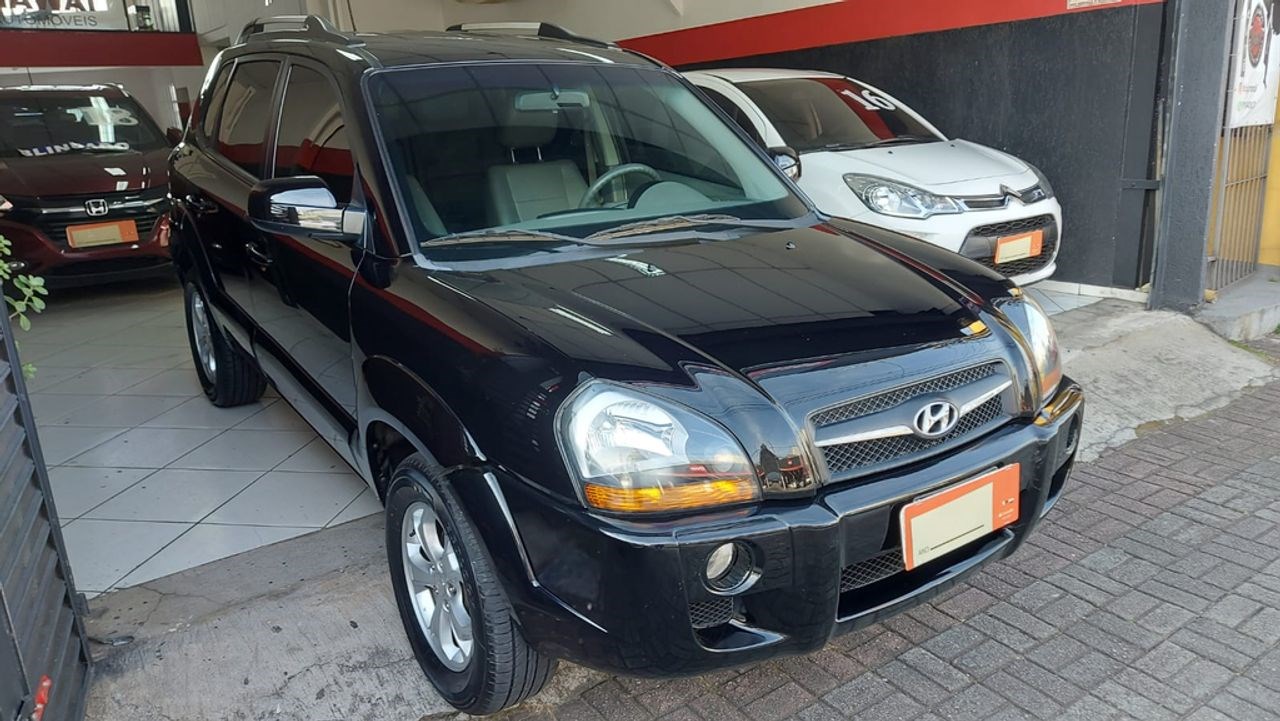 //www.autoline.com.br/carro/hyundai/tucson-20-gls-16v-flex-4p-automatico/2017/sao-paulo-sp/24426822