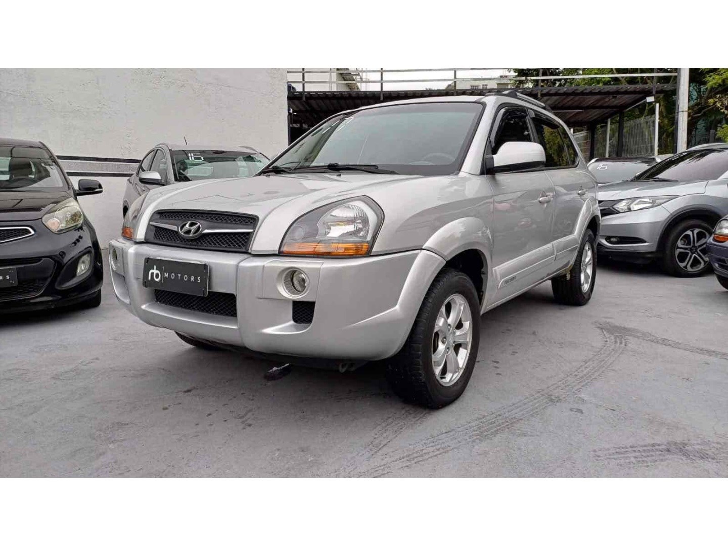 //www.autoline.com.br/carro/hyundai/tucson-20-gls-16v-flex-4p-automatico/2017/rio-de-janeiro-rj/24484535