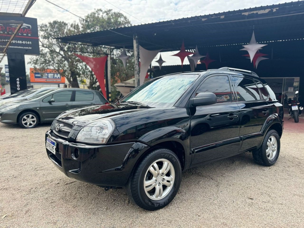 //www.autoline.com.br/carro/hyundai/tucson-20-gl-16v-gasolina-4p-automatico/2006/sorocaba-sp/24509354