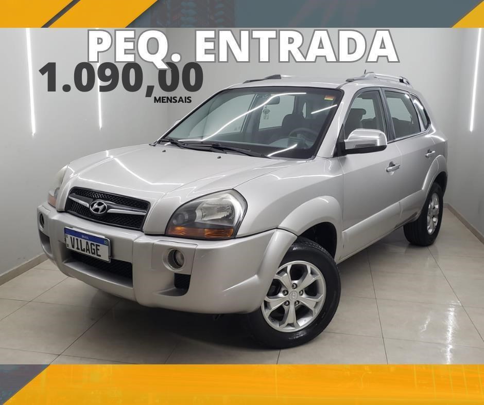 //www.autoline.com.br/carro/hyundai/tucson-20-gl-16v-gasolina-4p-automatico/2010/sao-paulo-sp/24705168