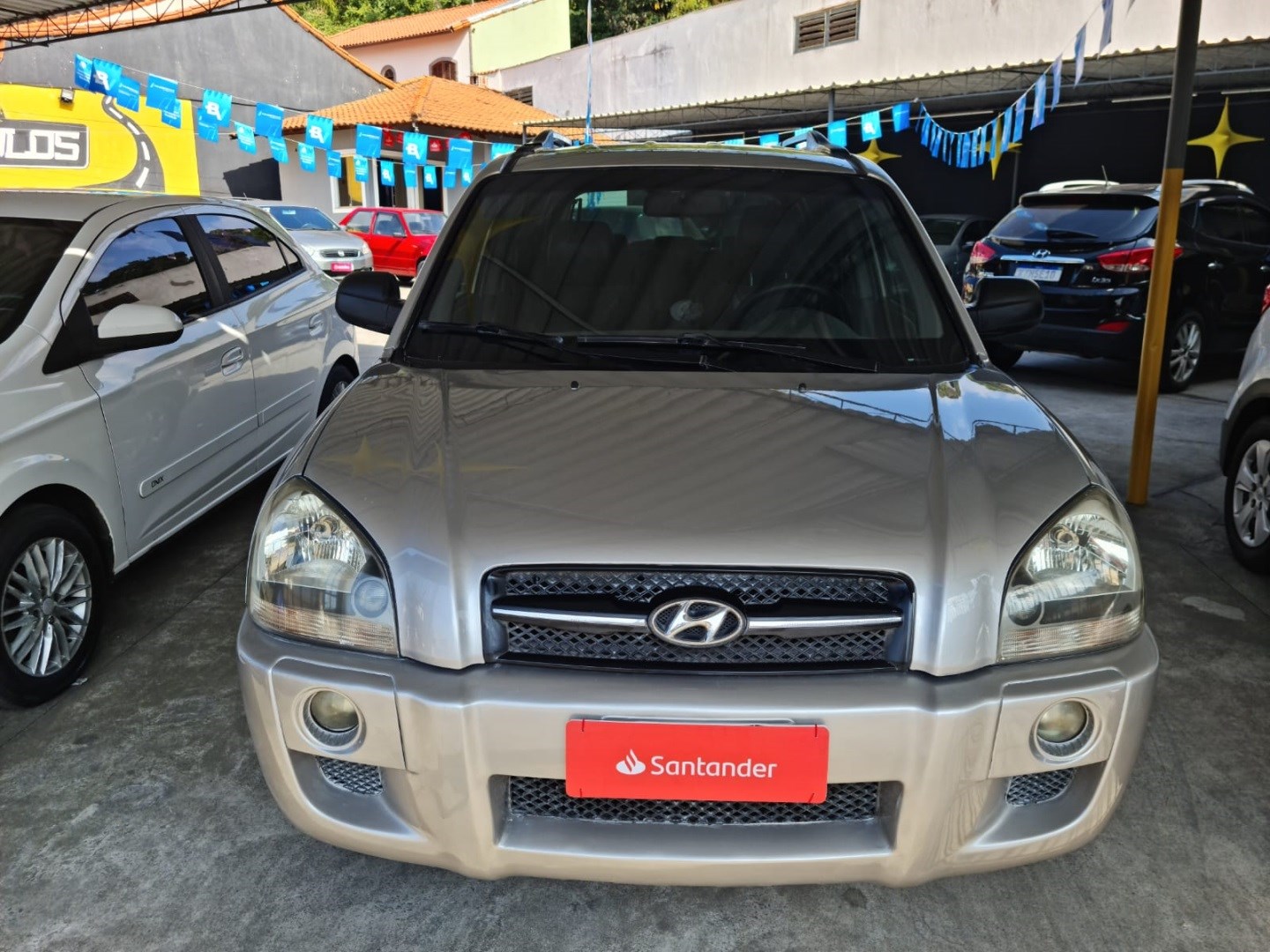 //www.autoline.com.br/carro/hyundai/tucson-20-gl-16v-gasolina-4p-automatico/2006/volta-redonda-rj/24724853