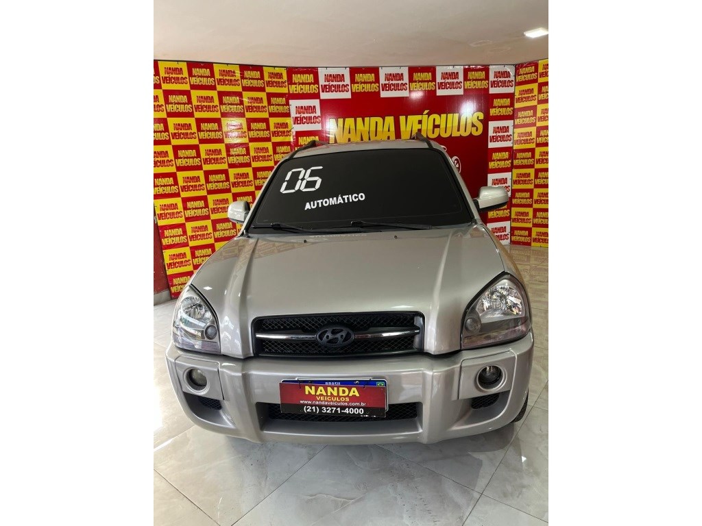 //www.autoline.com.br/carro/hyundai/tucson-20-gl-16v-gasolina-4p-automatico/2006/rio-de-janeiro-rj/24846797