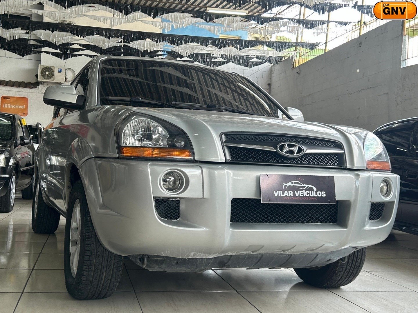 //www.autoline.com.br/carro/hyundai/tucson-20-gls-16v-flex-4p-automatico/2014/sao-joao-de-meriti-rj/24911860