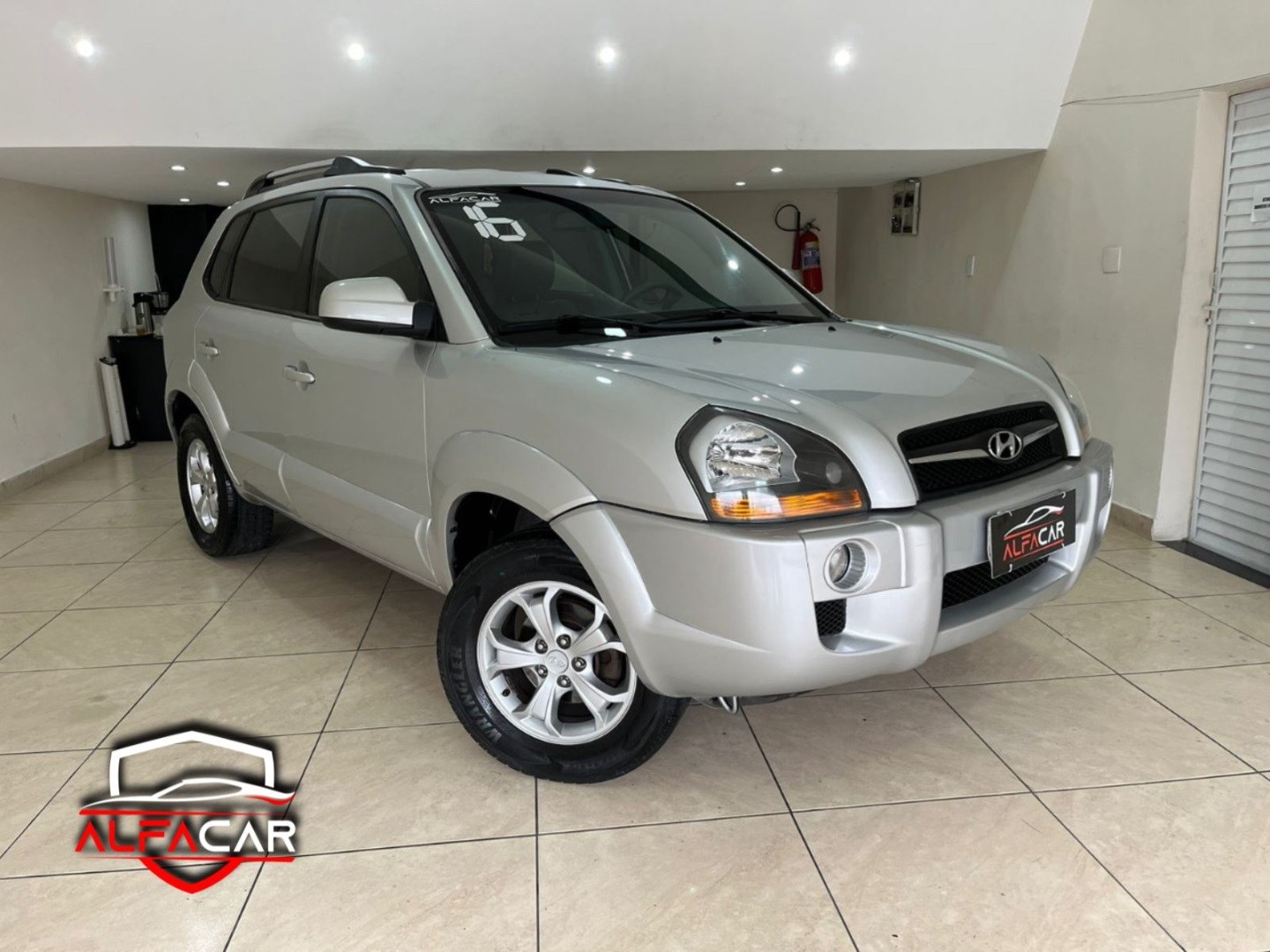 //www.autoline.com.br/carro/hyundai/tucson-20-gls-16v-flex-4p-automatico/2016/rio-de-janeiro-rj/24940646
