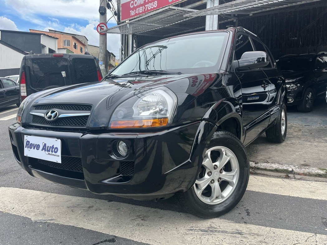 //www.autoline.com.br/carro/hyundai/tucson-20-gls-16v-flex-4p-automatico/2017/carapicuiba-sp/24989716
