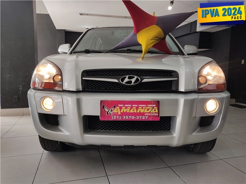 //www.autoline.com.br/carro/hyundai/tucson-20-gls-16v-flex-4p-automatico/2014/rio-de-janeiro-rj/25013732