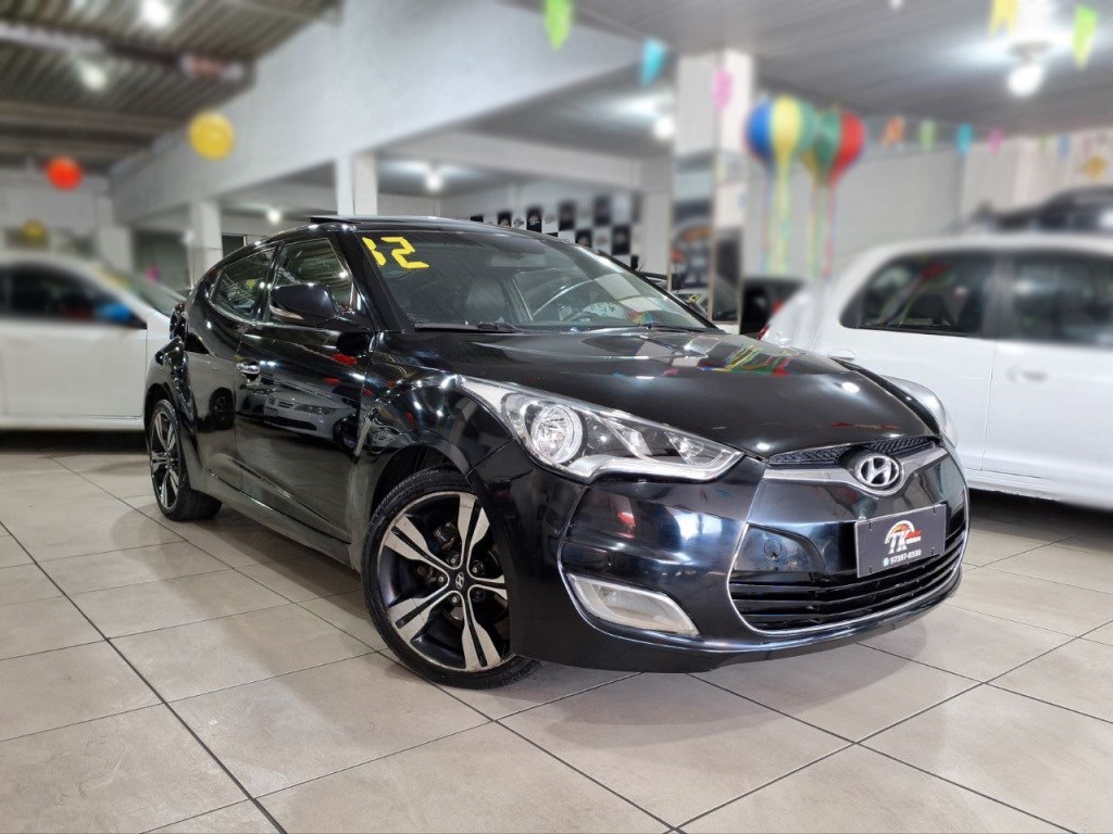 //www.autoline.com.br/carro/hyundai/veloster-16-16v-gasolina-4p-automatico/2012/rio-de-janeiro-rj/25032852