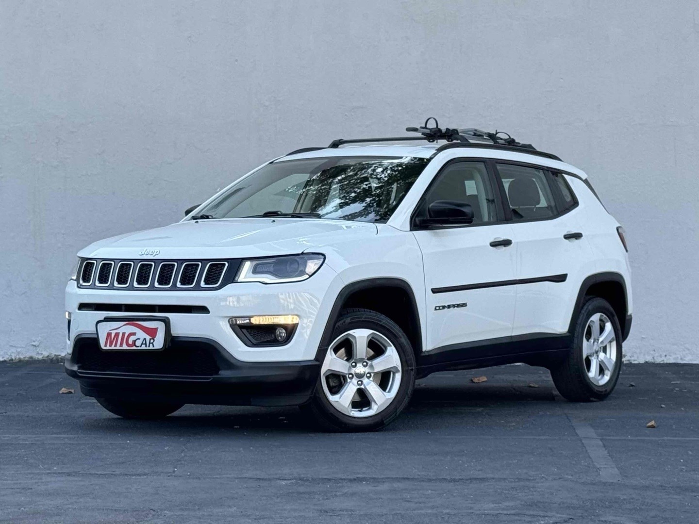 //www.autoline.com.br/carro/jeep/compass-20-sport-16v-flex-4p-automatico/2018/rio-de-janeiro-rj/24011925