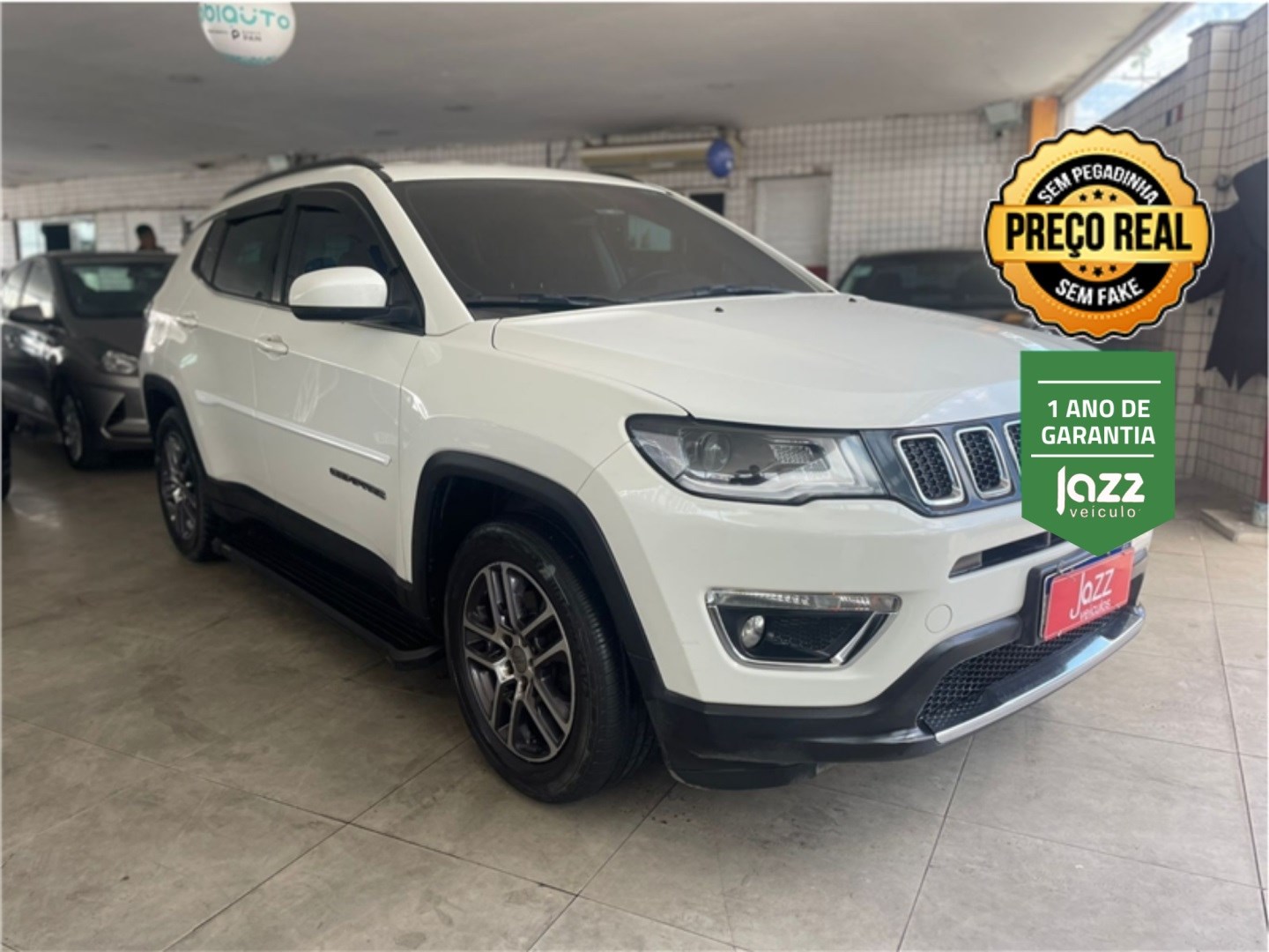 //www.autoline.com.br/carro/jeep/compass-20-sport-16v-flex-4p-automatico/2017/rio-de-janeiro-rj/24815949