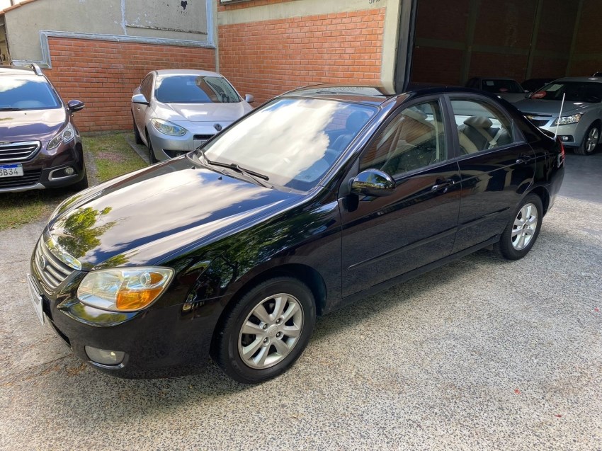 //www.autoline.com.br/carro/kia/cerato-16-ex-16v-gasolina-4p-automatico/2009/porto-alegre-rs/24205048