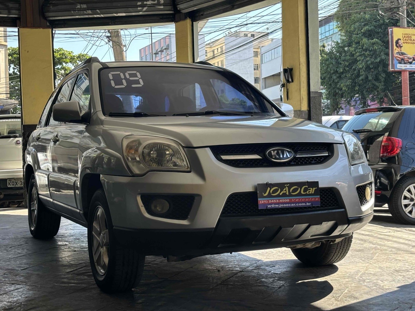 //www.autoline.com.br/carro/kia/sportage-20-ex-16v-gasolina-4p-automatico/2009/rio-de-janeiro-rj/24231251