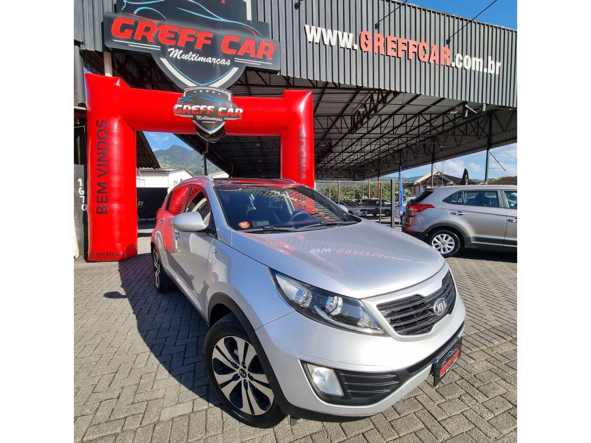 //www.autoline.com.br/carro/kia/sportage-20-lx-16v-flex-4p-4x4-automatico/2013/jaragua-do-sul-sc/24772327