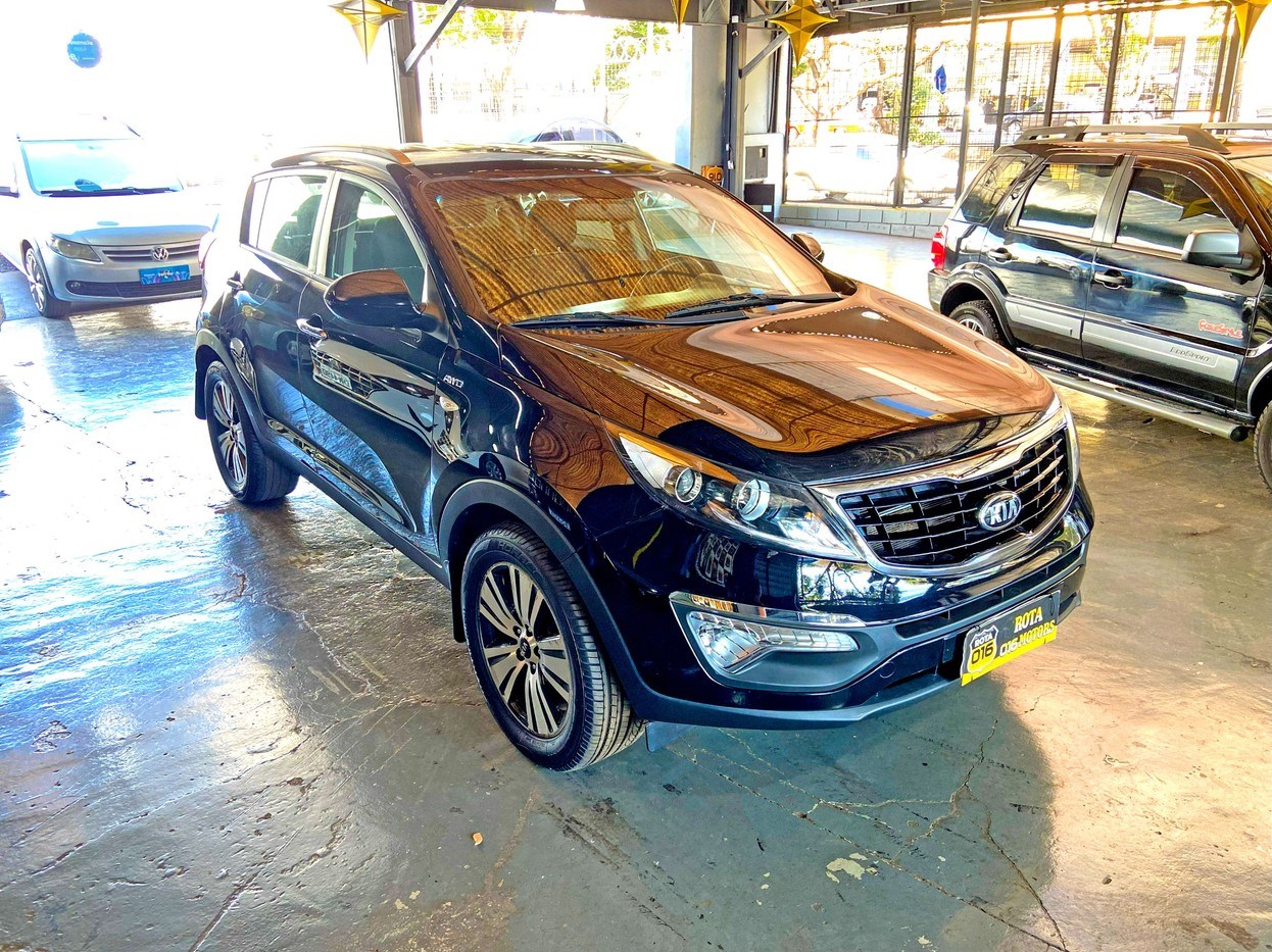 //www.autoline.com.br/carro/kia/sportage-20-4wd-ex-16v-178cv-4p-flex-automatico/2015/ribeirao-preto-sp/24787028