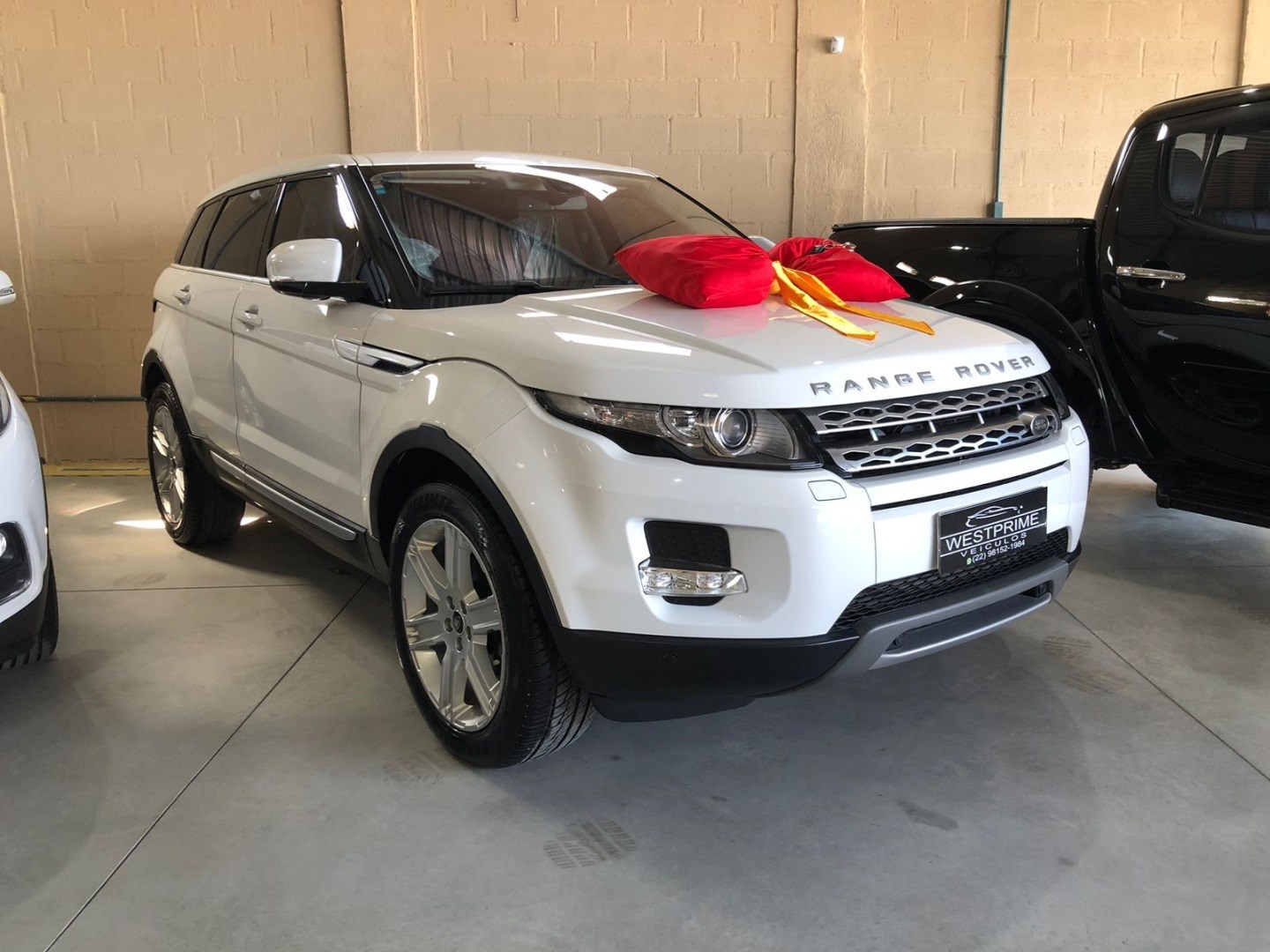 //www.autoline.com.br/carro/land-rover/range-rover-evoque-20-prestige-16v-gasolina-4p-4x4-turbo-automat/2013/araruama-rj/24595910