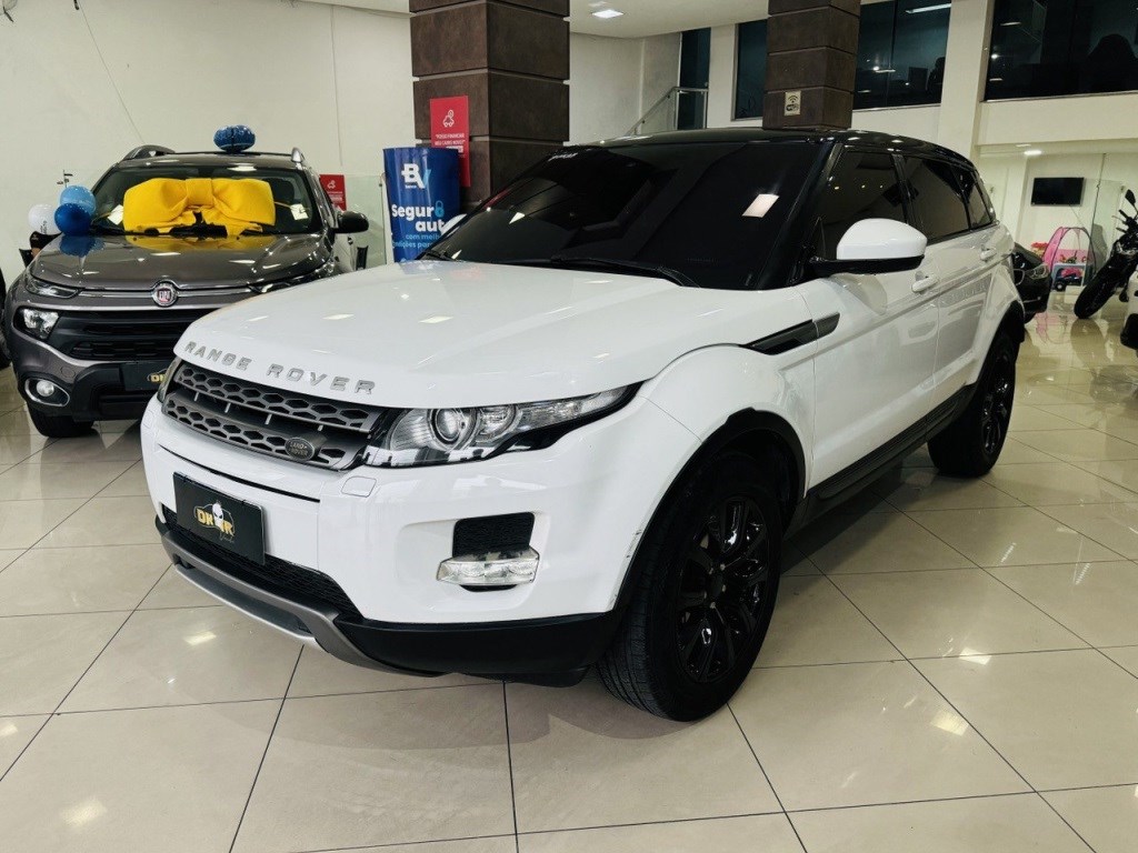 //www.autoline.com.br/carro/land-rover/range-rover-evoque-20-pure-tech-pack-16v-gasolina-4p-4x4-turbo-a/2014/rio-de-janeiro-rj/24634530