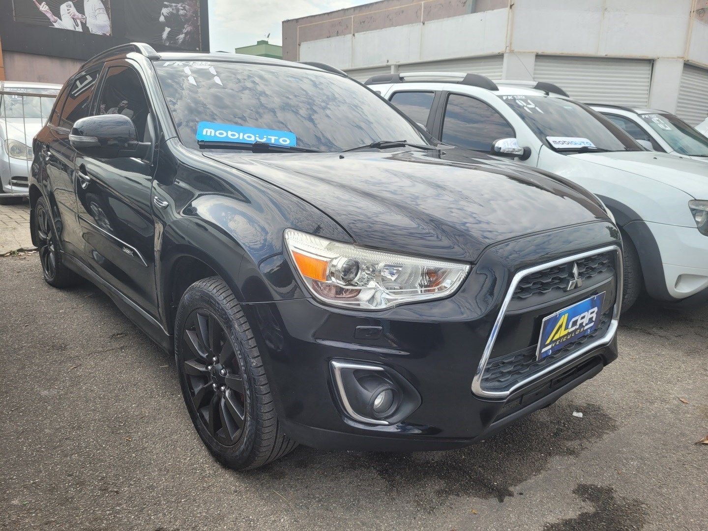 //www.autoline.com.br/carro/mitsubishi/asx-20-16v-gasolina-4p-4x4-cvt/2016/rio-de-janeiro-rj/24442617