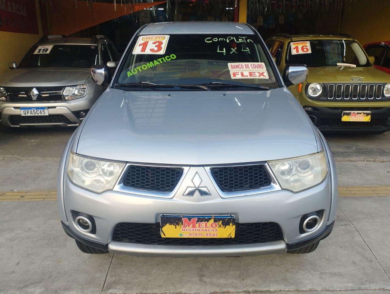 //www.autoline.com.br/carro/mitsubishi/l200-triton-35-v6-hpe-24v-flex-4p-4x4-automatico/2013/guarulhos-sp/24707909
