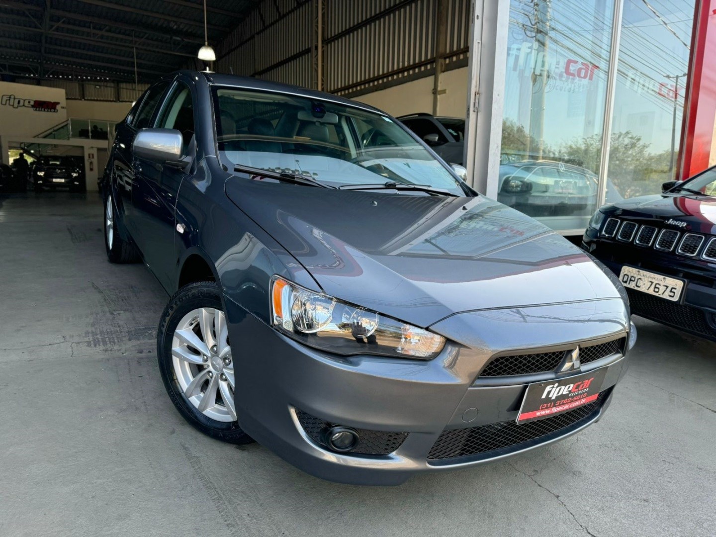 //www.autoline.com.br/carro/mitsubishi/lancer-20-sedan-hl-16v-gasolina-4p-cvt/2017/conselheiro-lafaiete-mg/24613909