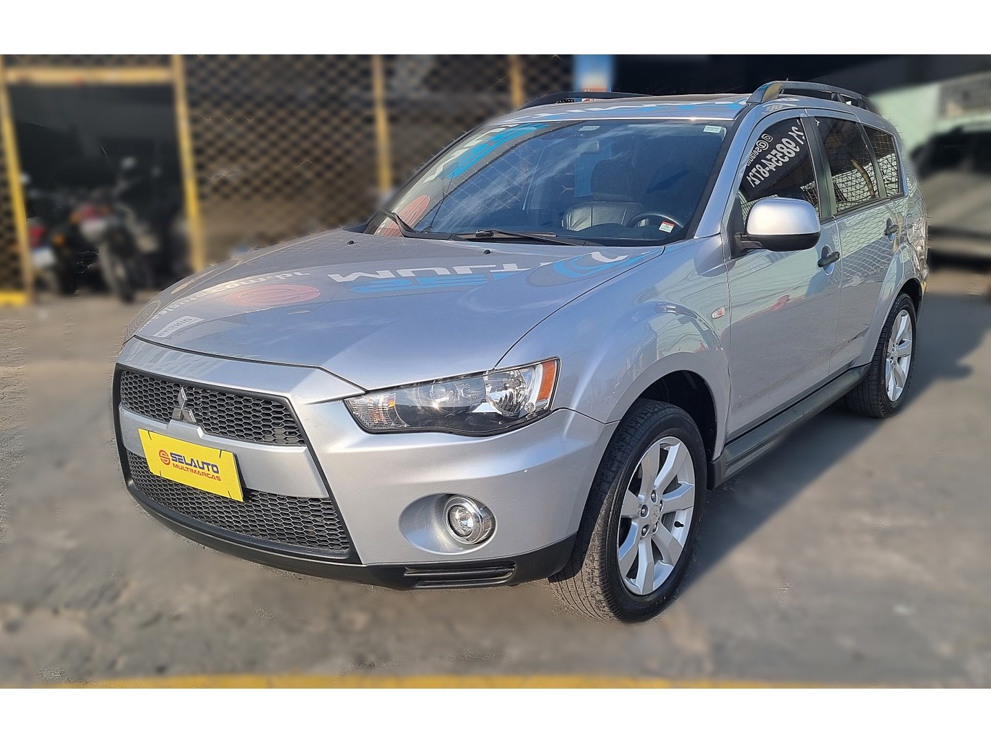 //www.autoline.com.br/carro/mitsubishi/outlander-20-16v-gasolina-4p-automatico/2012/rio-de-janeiro-rj/24458782