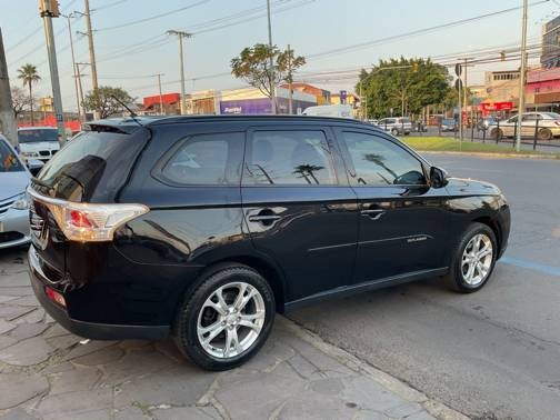 //www.autoline.com.br/carro/mitsubishi/outlander-20-16v-gasolina-4p-cvt/2014/porto-alegre-rs/24835503