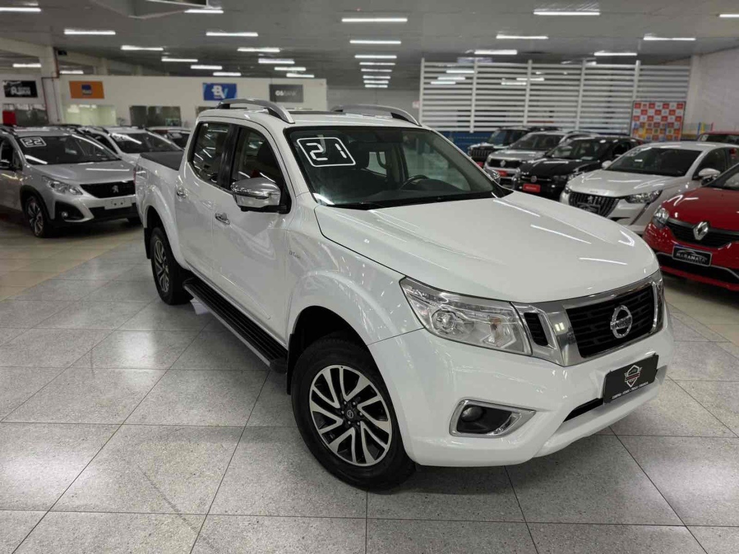 //www.autoline.com.br/carro/nissan/frontier-23-cd-le-16v-diesel-4p-4x4-turbo-automatico/2021/praia-grande-sp/24418895