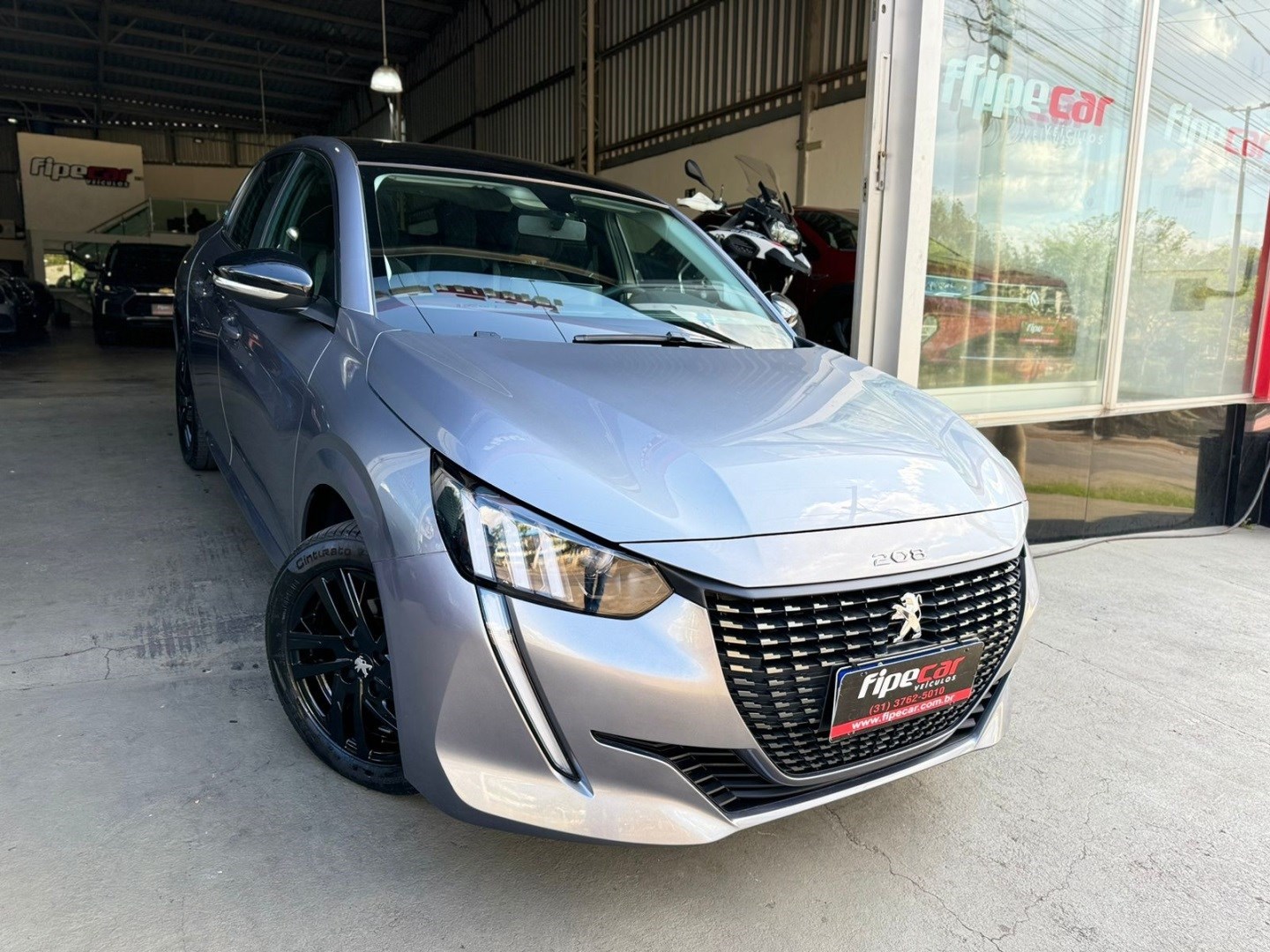 //www.autoline.com.br/carro/peugeot/208-10-style-6v-flex-4p-manual/2023/conselheiro-lafaiete-mg/24573875