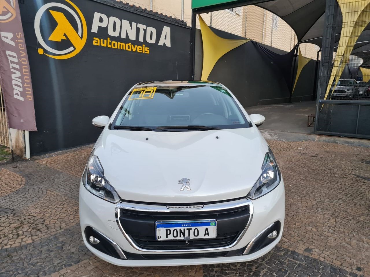 //www.autoline.com.br/carro/peugeot/208-12-allure-12v-flex-4p-manual/2018/campinas-sp/24781210