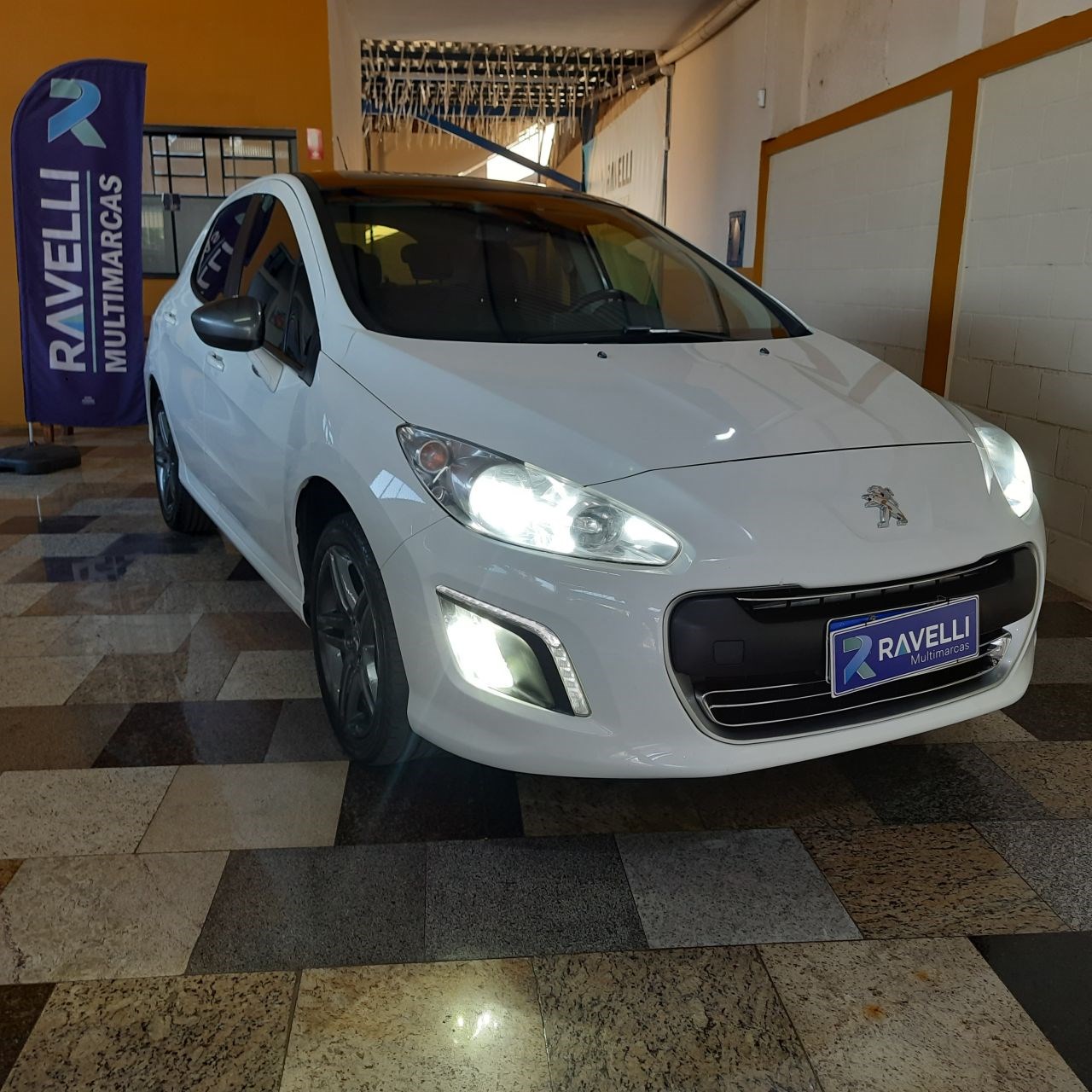//www.autoline.com.br/carro/peugeot/308-20-feline-16v-flex-4p-automatico/2013/piracicaba-sp/24708720