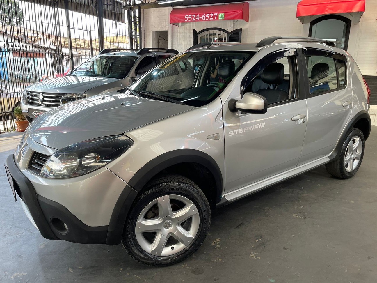 //www.autoline.com.br/carro/renault/sandero-16-stepway-16v-flex-4p-manual/2011/sao-paulo-sp/24157600