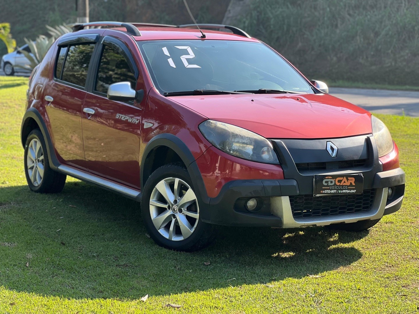 //www.autoline.com.br/carro/renault/sandero-16-stepway-16v-flex-4p-manual/2012/sao-joao-de-meriti-rj/24372755