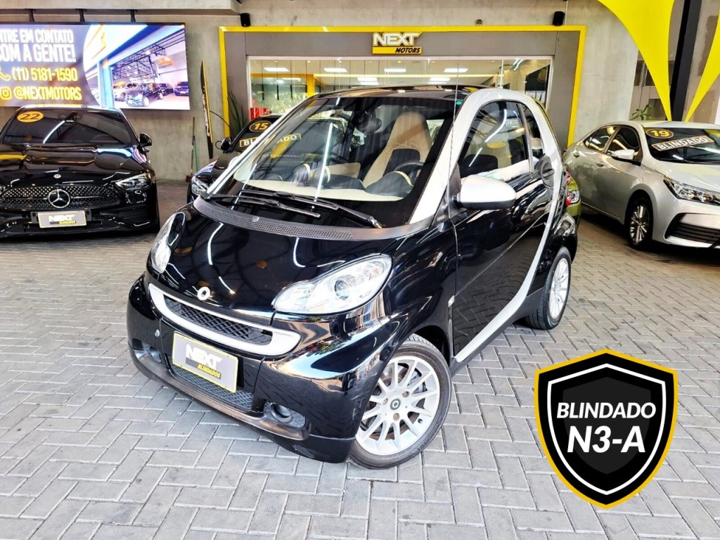 //www.autoline.com.br/carro/smart/fortwo-10-coupe-62kw-passion-12v-gasolina-2p-turbo-a/2010/sao-paulo-sp/24806339