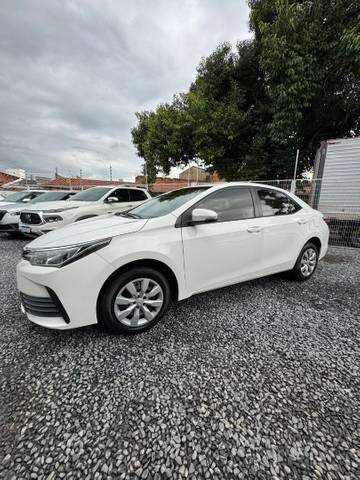 //www.autoline.com.br/carro/toyota/corolla-18-gli-16v-flex-4p-automatico/2018/cuiaba-mt/23469563