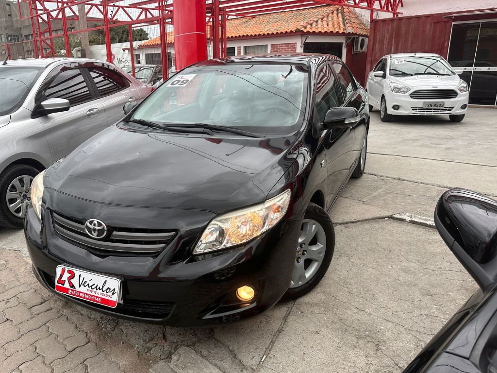 //www.autoline.com.br/carro/toyota/corolla-18-xei-16v-flex-4p-automatico/2009/rio-grande-rs/23553206