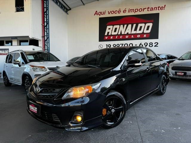 //www.autoline.com.br/carro/toyota/corolla-20-xrs-16v-flex-4p-automatico/2013/amparo-sp/23771142