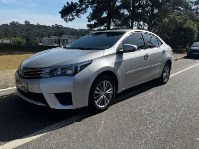 //www.autoline.com.br/carro/toyota/corolla-18-gli-16v-flex-4p-automatico/2016/mafra-sc/24187127