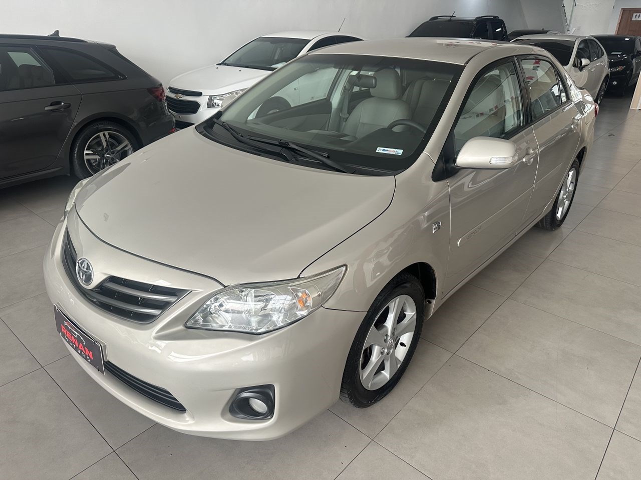 //www.autoline.com.br/carro/toyota/corolla-20-xei-16v-flex-4p-automatico/2013/santa-barbara-doeste-sp/24612366