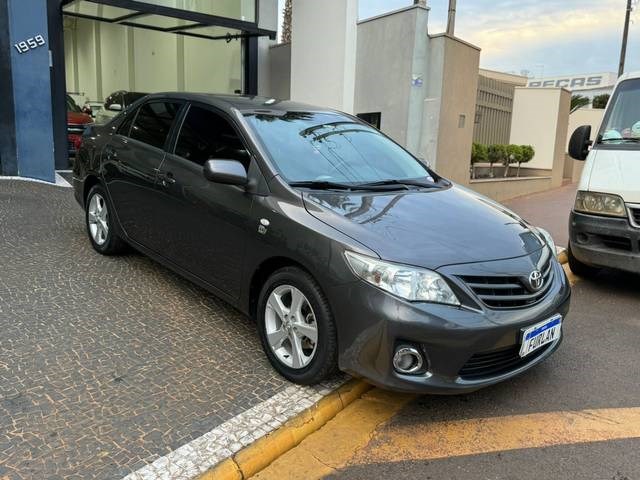 //www.autoline.com.br/carro/toyota/corolla-18-gli-16v-flex-4p-automatico/2014/itapolis-sp/24646336