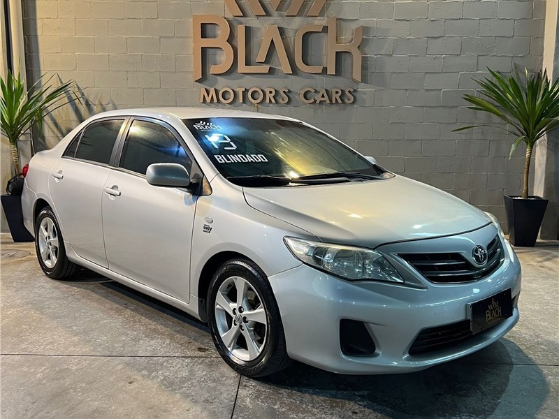 //www.autoline.com.br/carro/toyota/corolla-18-gli-16v-flex-4p-automatico/2013/rio-de-janeiro-rj/24652271