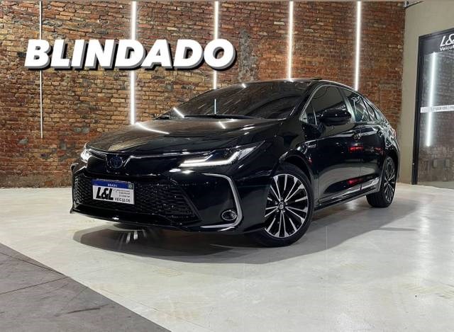 //www.autoline.com.br/carro/toyota/corolla-18-sedan-altis-premium-hybrid-16v-flex-4p-cvt/2024/sao-paulo-sp/24682616