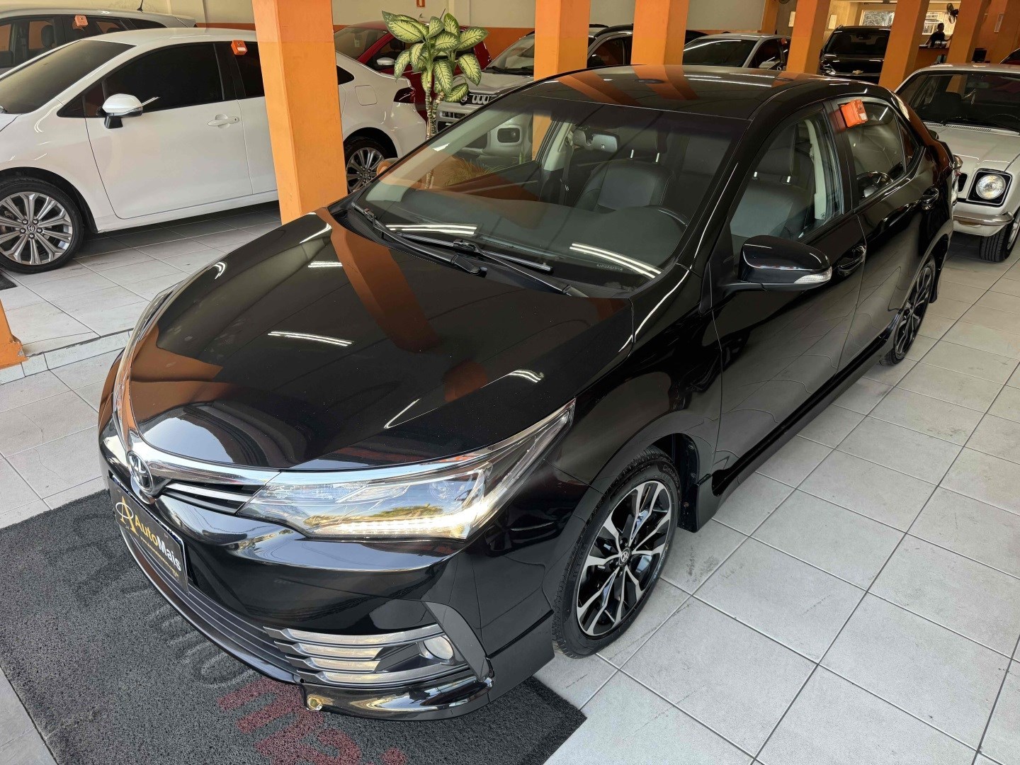 //www.autoline.com.br/carro/toyota/corolla-20-xrs-16v-flex-4p-automatico/2018/nova-serrana-mg/24839291
