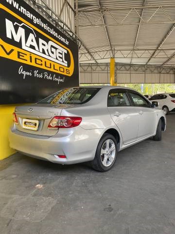 //www.autoline.com.br/carro/toyota/corolla-18-gli-16v-flex-4p-automatico/2013/guarapari-es/24898018