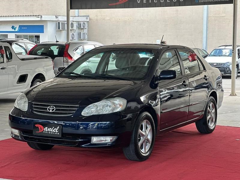 //www.autoline.com.br/carro/toyota/corolla-18-xei-16v-gasolina-4p-manual/2004/serra-es/24912532