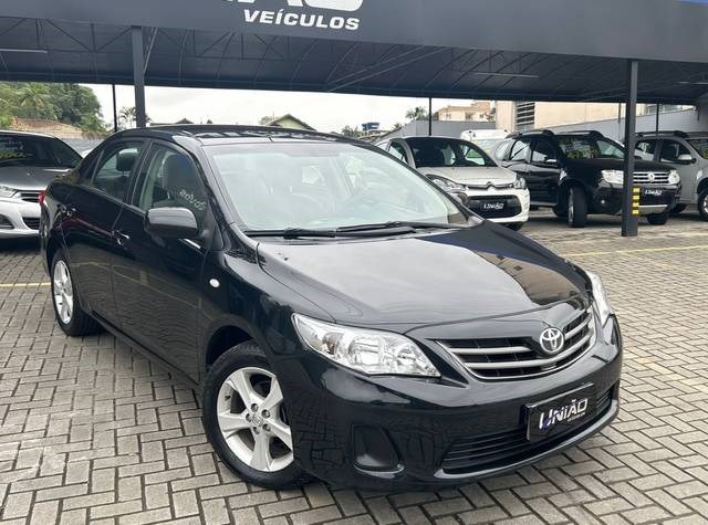 //www.autoline.com.br/carro/toyota/corolla-18-gli-16v-flex-4p-automatico/2013/joinville-sc/24912856