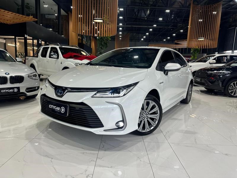 //www.autoline.com.br/carro/toyota/corolla-18-altis-hybrid-16v-flex-4p-cvt/2022/santa-cruz-do-sul-rs/24931991