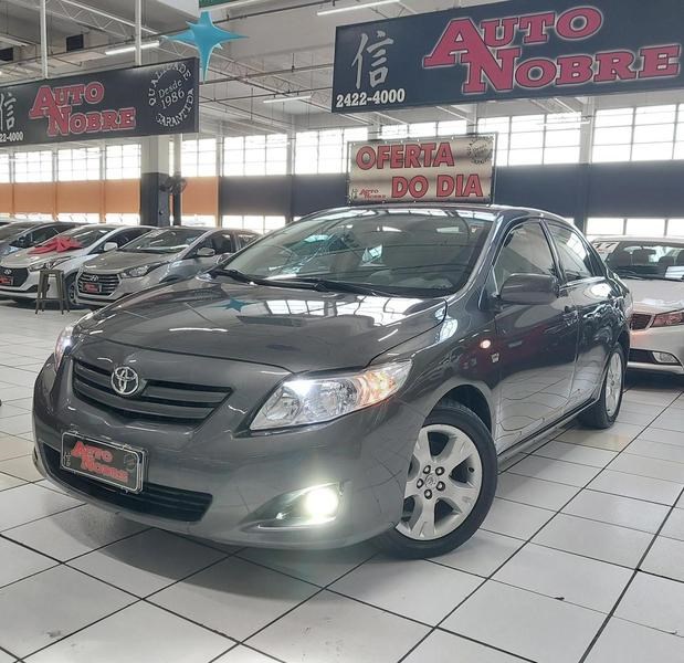 //www.autoline.com.br/carro/toyota/corolla-18-gli-16v-flex-4p-automatico/2011/guarulhos-sp/25017660