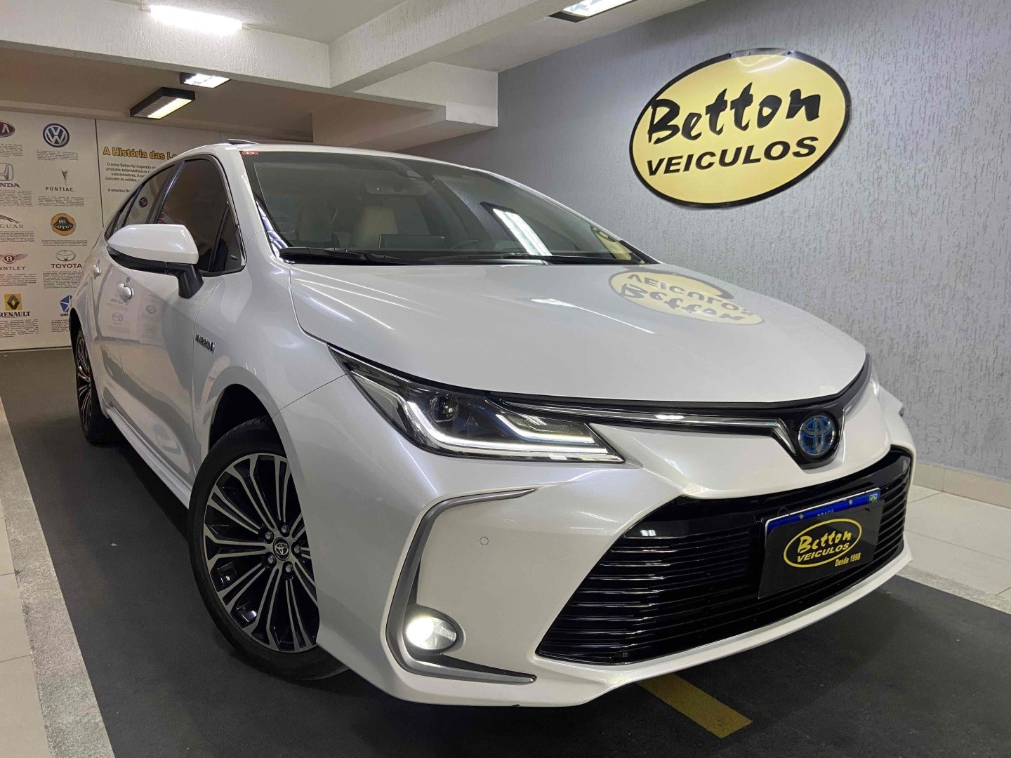 //www.autoline.com.br/carro/toyota/corolla-18-altis-premium-hybrid-16v-flex-4p-cvt/2022/niteroi-rj/25022668