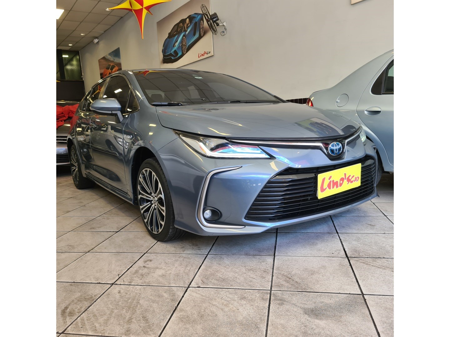//www.autoline.com.br/carro/toyota/corolla-18-altis-premium-hybrid-16v-flex-4p-cvt/2020/nova-iguacu-rj/25025465