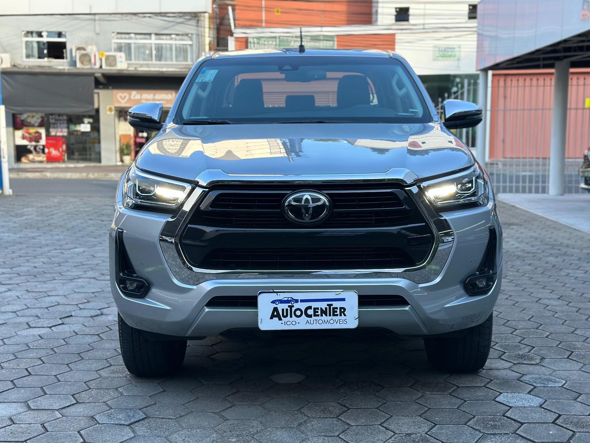 //www.autoline.com.br/carro/toyota/hilux-28-cd-srx-16v-diesel-4p-4x4-turbo-automatico/2021/blumenau-sc/23586882