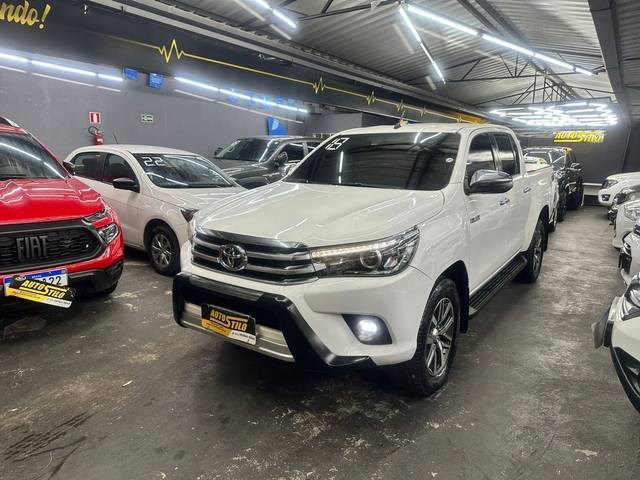 //www.autoline.com.br/carro/toyota/hilux-28-cd-srx-16v-diesel-4p-4x4-turbo-automatico/2018/cataguases-mg/23896991